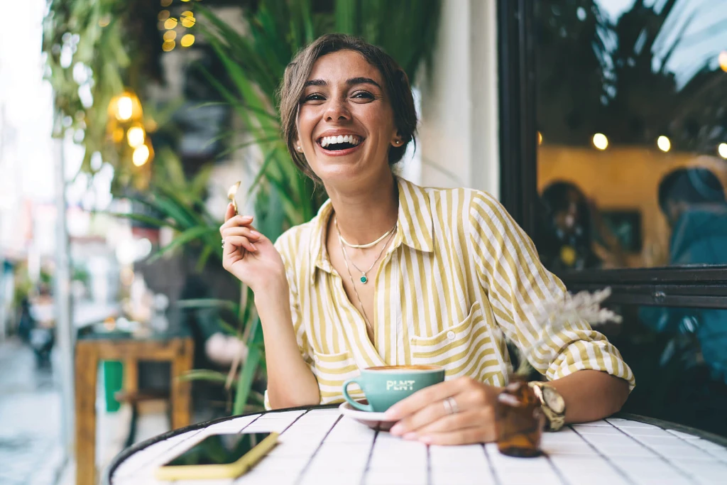 Lady with PLNT coffee LR.jpg
